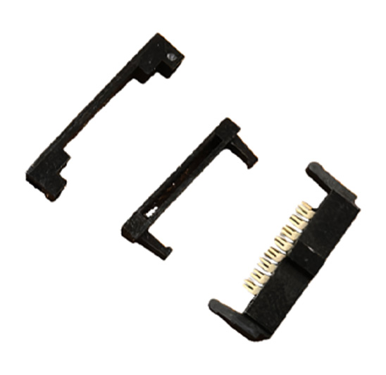 1.27 mm × 1.27 mm pitch IDC receptacle connector with three-piece plastic housing construction